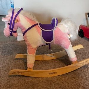 Little girls rocking horse